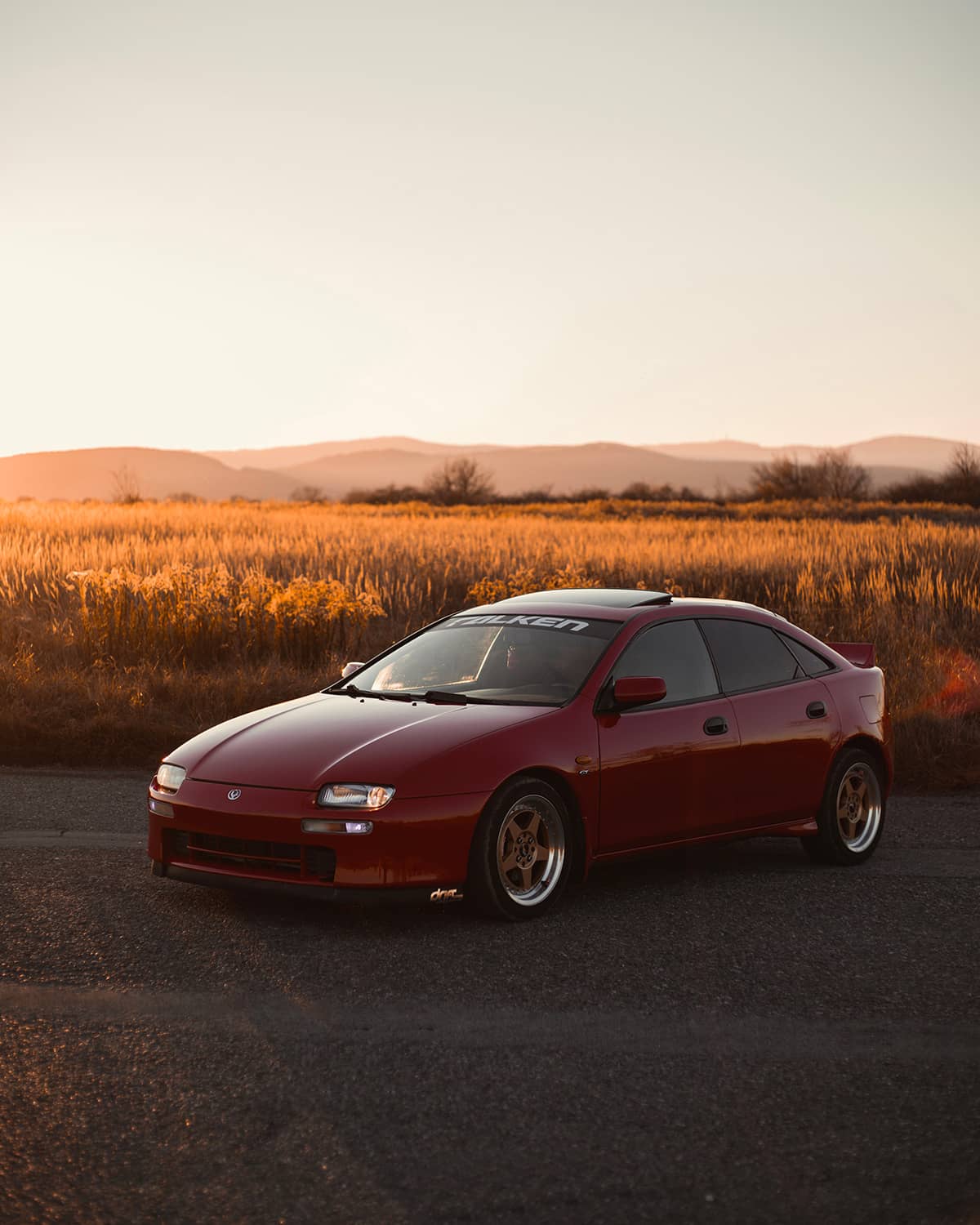 Lowered Mazda Lantis - An Odd-Ball Japanese Sports Hatchback from the 90s -  TunerDNA